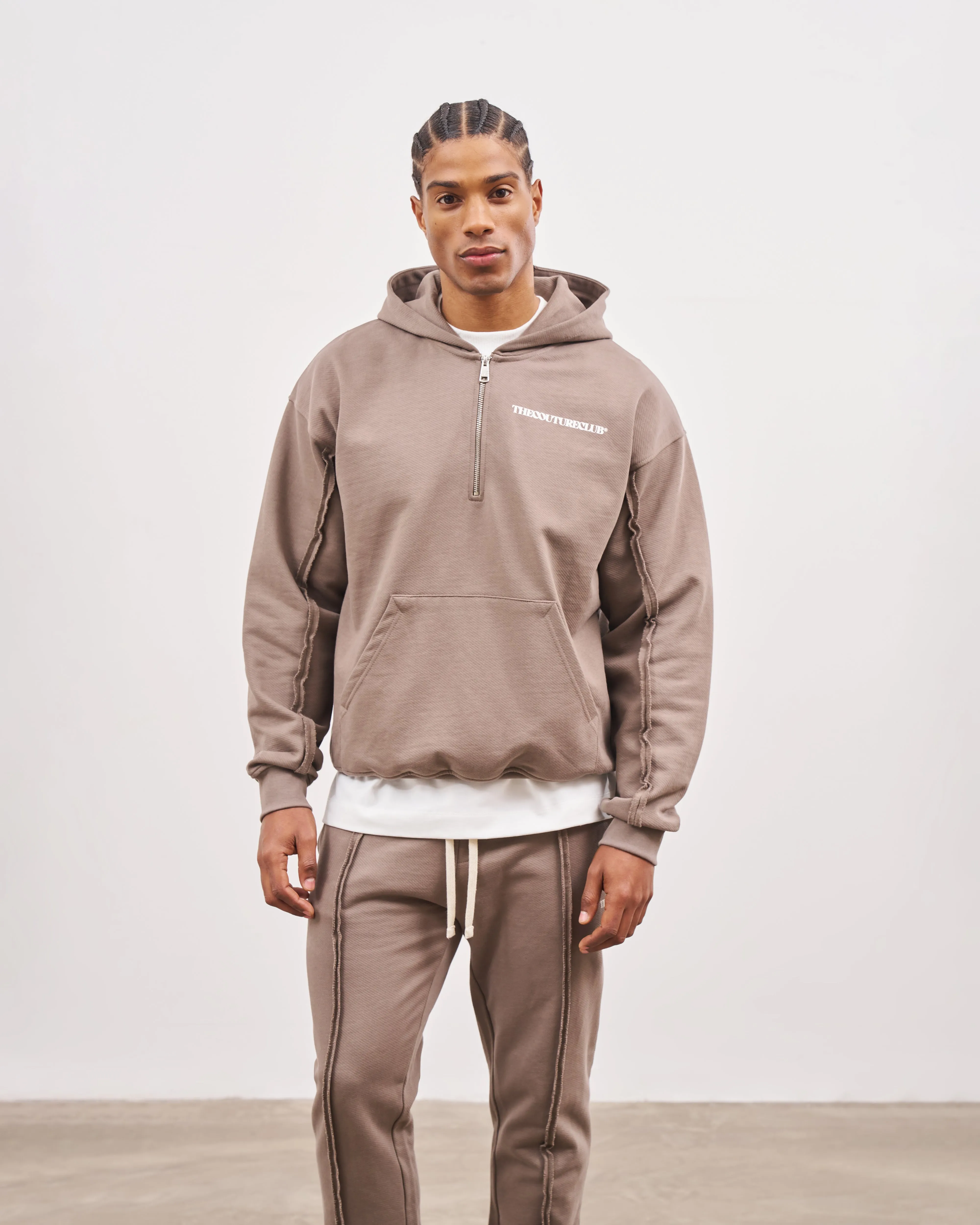 RAW SEAM QUARTER ZIP HOODIE - COFFEE